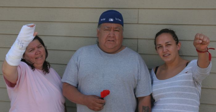 Susanne Patles, freed from custody, celebrates with Eslipogtog war chief John Levi and Lorraine Clair, also recently arrested and now in cast as a result. [Photo: M. Howe]