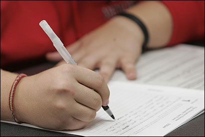 Standardized testing and subsequent teacher standards have a rich and intertwined history with private business and the neo-liberal movement. [photo: boston.com]