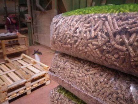 In 2014, thousands of tons of wood pellets were shipped overseas while Nova Scotians went without. [Photo Deustche Welle via flickr]