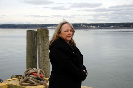 The spouse of a herring fisherman who drowned in the Pubnico Bay is one of the subjects of a fascinating photo exhibit on display at Pier 21 on April 28, the national day of mourning for workers killed or injured on the job.  Photo Trevor Beckerson, all rights reserved.