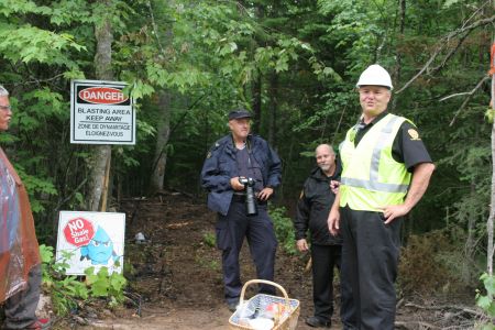 By now a familiar site. Police and security together bar entrance to SWN's seismic testing lines. [Photo: M. Howe]