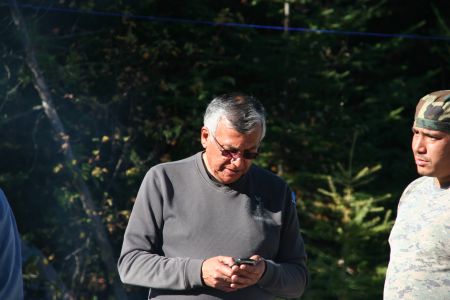 Lost in Text-lation? Alfred Sock says he texted the invitees list to Elsi Chief and council; but no response. [Photo: M. Howe]