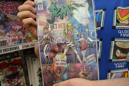 A close-up of this exclusive comic cover shows Wall and his staff rocking out in the mosh pit below the stage on Citadel Hill.