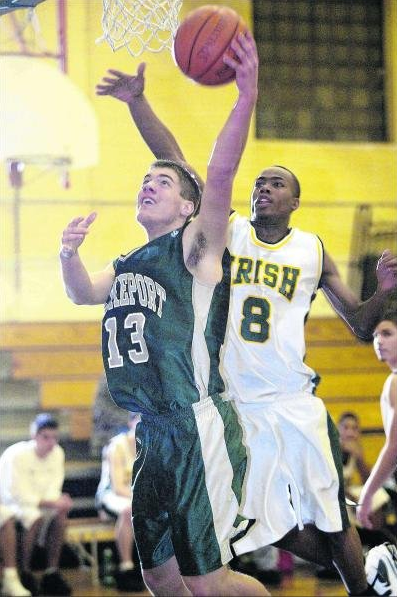 Carvery (right) playing basketball for St. Patrick's High School. (Photo from Facebook)