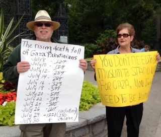 Larry and Linda protest the bombings of Gaza