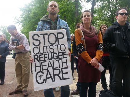 About 50 protesters gathered outside of the Dalhousie’s Sir Charles Tupper Medical Building to call on the federal government to reverse the 2012 cuts made to refugees' healthcare.  Photo Stephanie Taylor