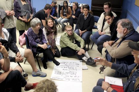 Participants met in small groups to discuss short- and long-term courses of action. (Photo: Stella Ducklow)