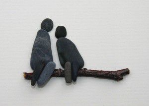 A piece of pebble art by Sharon Nowlan accompanying Kristen Amiro's poem 'Reunion.' [http://pebbleart.ca]