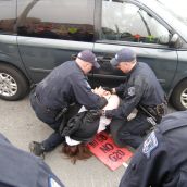 CUPW leader being arrested later in the march