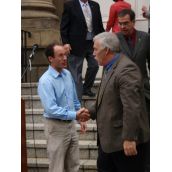 Rally Organizer and EAC Forestry Program Coordinator, Jamie Simpson, shaking hands with and Minister of Natural Resources, John MacDonell. 