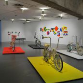 In Anishnaabensag Blimskowebshikgewag (2012), Metis artist and art historian Dylan Miner, revisits the theme of migration through low-rider bicycles.
