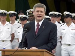 Admiral Harper speaks onboard the Canadian frigate HMCS Fredericton in the Caribbean, July 19, 2007, while on a visit to Colombia, Chile, Barbados and Haiti. The Canadian frigate was deployed as part of “Op Caribe,” a war exercise aimed to build “maritime domain awareness.”