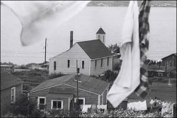 Africville and it's destruction was a major point of discussion on the topic of oppression, loss and hope for Black Nova Scotians.  Photo: Bob Brooks, photographer, ca. 1965; NSARM, Bob Brooks fonds, 1989-468, box 16 / neg. sheet 5, image 16