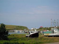 The harbour at Bay St. Lawrence, NS. Source: Wikimedia Commons