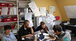 Cramming in the age of austerity. Students pull double duty as they occupy Nova Scotia Finance Minister Diana Whalen's office, while hitting the books. [Photo: M. Howe]