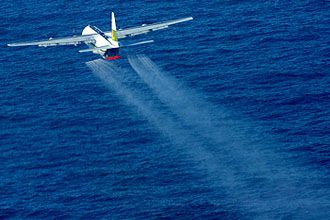 Out of sight, out of mind? Maybe, but the widespread spraying of dispersants doesn't 'clean up' an oil spill. In fact, research suggests it actually just makes it more toxic. [Photo: US Navy]