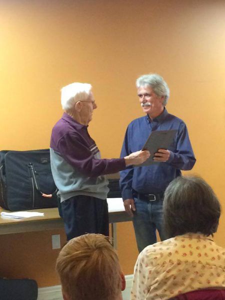 Paul O'Hara (right) receiving the Metro Non Profit Housing Association's Williamson Award earlier this month from the hands of John Williamson himself.  After 35 years of with the North End Community Health Centre Paul will retire at the end of the month. Photo Facebook
