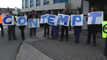 Newfoundlanders demonstrate against Harper on his visit to St. John’s on April 30, 2011 during the recent federal election
