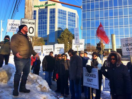 While a tentative agreement was in the works many Haligonians showed their support for the locked out Herald workers during a solidarity rally held this morning in front of the Herald Building on Joe Howe Avenue. Photo Tony Tracy, facebook