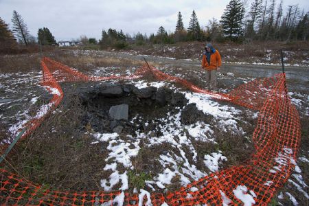 Test pit at the DDV Gold property in Moose River Gold Mines on the Eastern Shore.  Critics charge that in Nova Scotia mining interests take precedence over any concerns Nova Scotians may have. Photo by Dan Hutt, all rights reserved