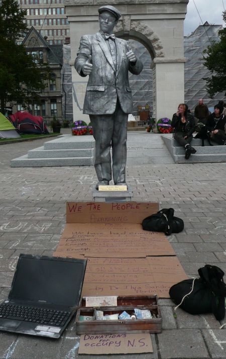 "Enough is enough," says Granite Man, who is splitting his earnings with Occupy Nova Scotia.