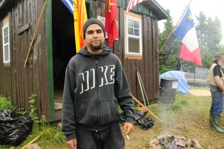 Thomas in front of the Skidoo Shack on Bronson Road where a truck was seized on July 27 (Photo: Rana Encol)
