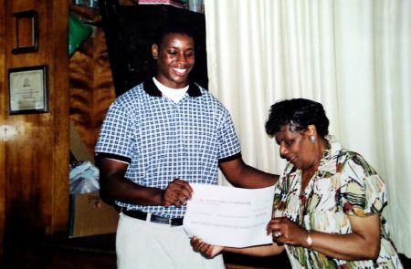 Jerome Downey receives the first Buddy Daye Scholarship in 2003. (Photo Contributed by Jerome Downey)