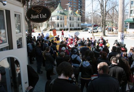 About 120 people gathered outside Just Us! on Spring Garden Road in April. (Photo by Hilary Beaumont)