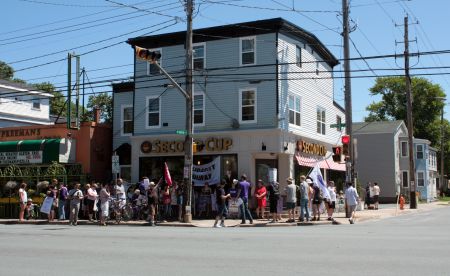 About 40 people gathered outside the Quinpool Road Second Cup on Saturday. (Photo by Hilary Beaumont)