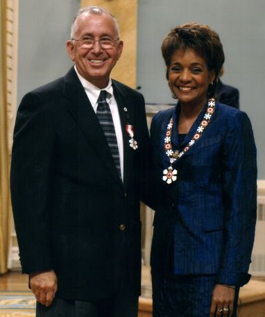 Daniel N. Paul and Governor General Michaelle Jean. 1st Medallion:Order of Nova Scotia. 2nd Medallion: Order of Canada.