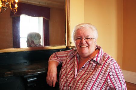Building administrator Donna Merriam says goodbye to Victoria Hall. (Photo by Hilary Beaumont.)