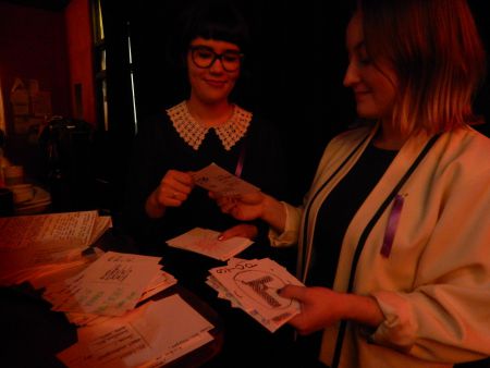 Katelyn Armstrong and Eliza Leitch collect postcards done by the audience for their Halifax for a Public Inquiry letter writing campaign. Armstrong and Leitch started the project from a assignment at the School of Social Work at Dalhousie. The postcards will be taken to the House of Commons by NDP MP Megan Leslie.