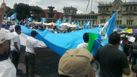Thousands of Guatemalans gather in the Central Plaza.