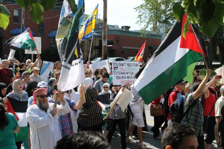 Close to 300 protesters marched through downtown Halifax yesterday to raise awareness of Israel’s ongoing attacks on Gaza city.  Photo Randa Ataya