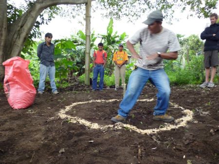 Gregorio Ajcot creates a permaculture design with participants at a workshop at IMAP. (Photo courtesy of IMAP)