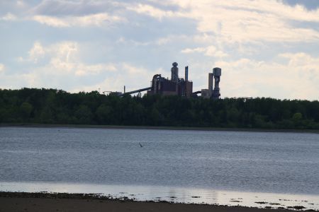 Between 1989-2014, the Ministry of the Environment was soft-handed with the Abercrombie Point pulp mill in Pictou, Nova Scotia. During that time, despite breaking numerous federal emissions thresholds, sometimes by thousands of percentage points, the mill was issued all of three warnings. Now, with the threat of a new, 'tougher', Industrial Approval looming, the mill laments that new regulations will destroy its competitive edge. [Photo: M. Howe] 