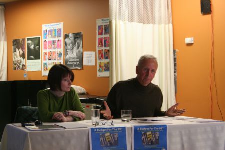 Economist Michael Bradfield makes a point while Nova Scotia CCPA director Christine Saulnier looks on. The 2014 alternative budget is a comprehensive document that rejects austerity and calls for fundamental changes to the way budget priorities are set. Photo Robert Devet
