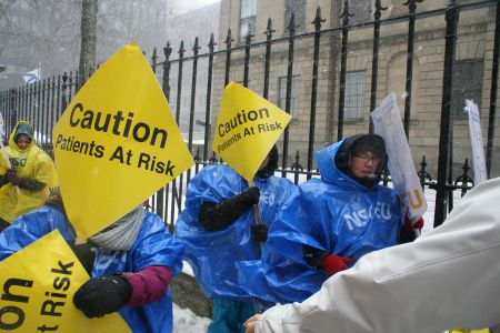NSGEU members braving blizzards and freezing rain to show their displeasure with back-to-work legislation at Province House.  Photo Robert Devet