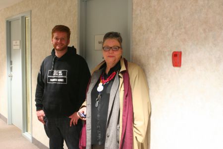 Spokespersons Margaret Anne McHugh and Kyle Buott took part in the occupation earlier this morning, but after talking to the press in the hallway found themselves locked out of Regan's office.  Photo Robert Devet