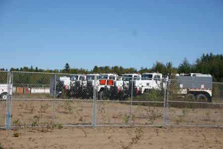 Thumpers behind an inner fenced compound. Unverified rumours sugest the land is Irving-owned. [Photo: M. Howe]