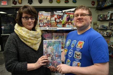 Katie Lantz (left) and Darryl Wall (right) of Giant Robot Comics show off the next ’80s nostalgic icon they’re bringing to Halifax via an exclusive store cover – this time, it’s Jem and the Holograms (or rather, their rivals, the Misfits)!