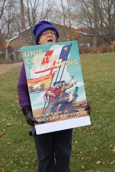 One Acadian demonstrator displayed the Edward Kwong poster, United Against Fracking, "In Solidarity With New Brunswick"