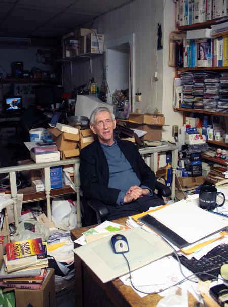 Ken-Porter, owner of the K-PC computer computer company, sits at his desk inside his Agricola Street building. (Photo by Hilary Beaumont)
