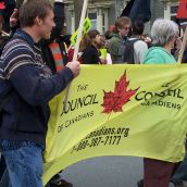 Members of The Council of Canadians add their support to the march
