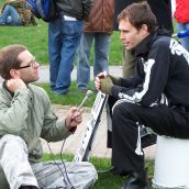 A CKDU and Halifax Media Co-op journalist interviews a protester