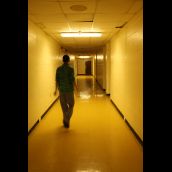 Former St. Pat's student Kadeem Hinch walks through the empty hallways of his old school. It's summer vacation.