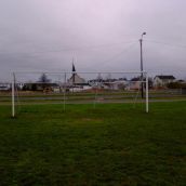 Whitney Pier. The soccer net is a symbol of soccer and how some people can't afford to play soccer in a organized team but you can play on a public field!