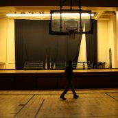 Hinch walks across the creaky floor of the St. Pat's gym. He remembers how much effort the school put into presenting Christmas plays on this stage every year.