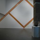Rolande Souliere's large-scale installation of street barrier tape represents the government's control of land claims
