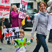 Lisa Smith (right) and Vella Smith participate in the march, which was attended by many children whose families were enraged by the lack of choice given to consumers when it comes to the labelling of GMOs.